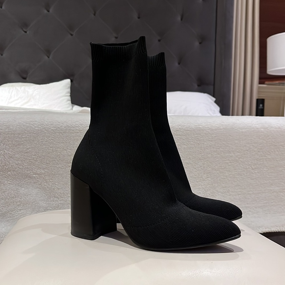 Steve Madden black heeled sock bootie